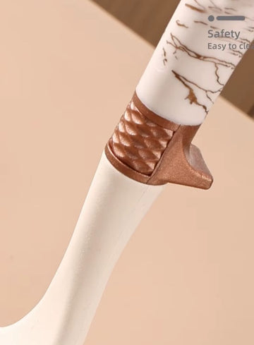 Set 11 ustensile de bucatarie din silicon si suport depozitare crem marmorat si accente bronze